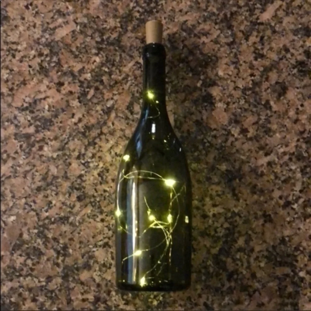 Fairy lights in wine bottle